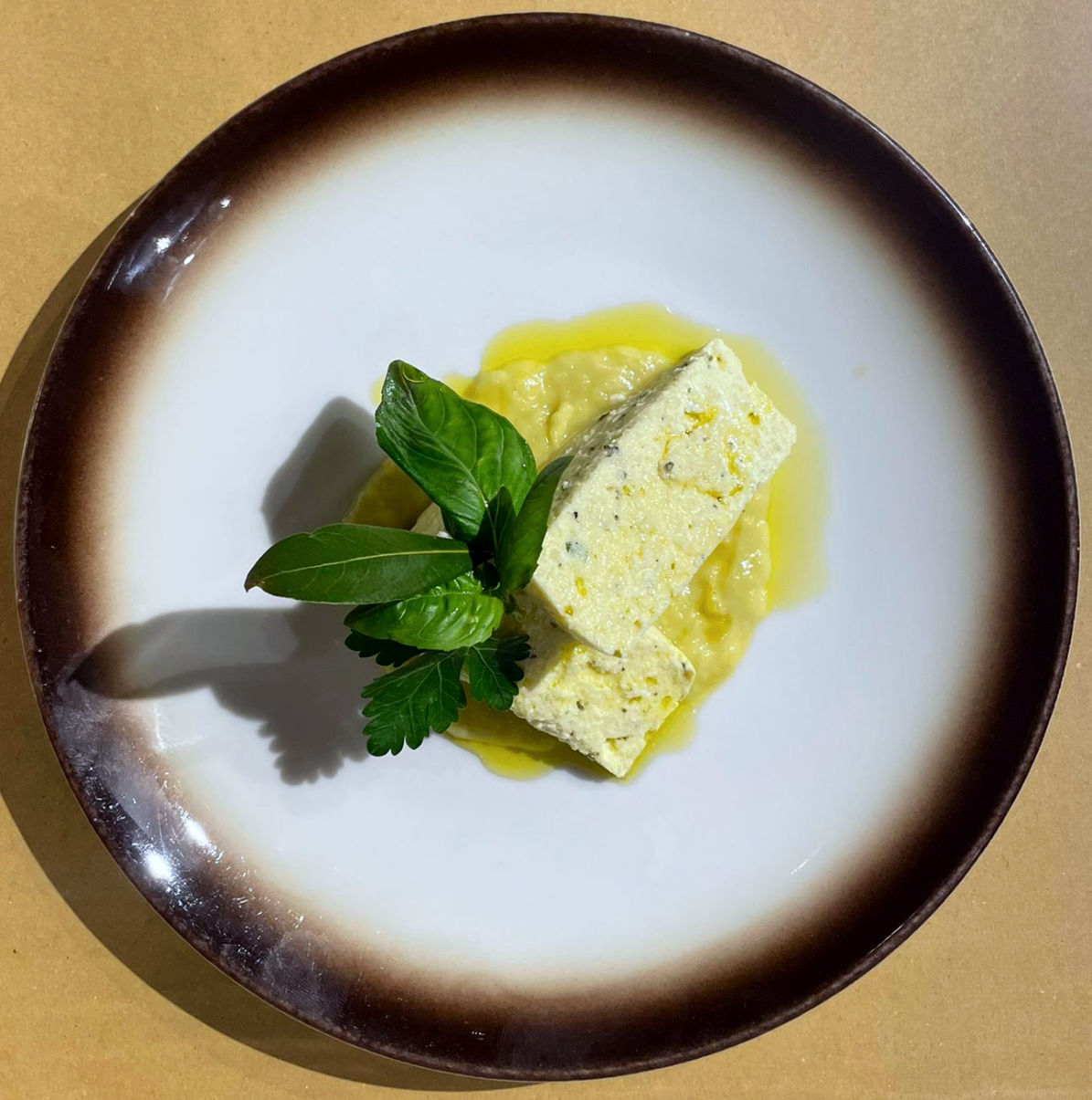 Sformato di ricotta di pecora alle erbe con salsa di porri - Trattoria Maga Magò - Firenze